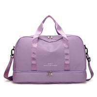 image du sac de voyage femme tendance de couleur violet